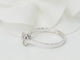 Bague solitaire en or blanc et diamants 0.15ct