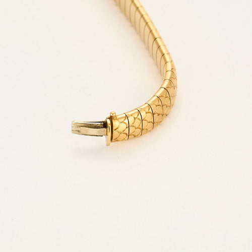 Bracelet Bracelet serpent articulé or jaune, rubis et lapis lazulli 58 Facettes BIA0926