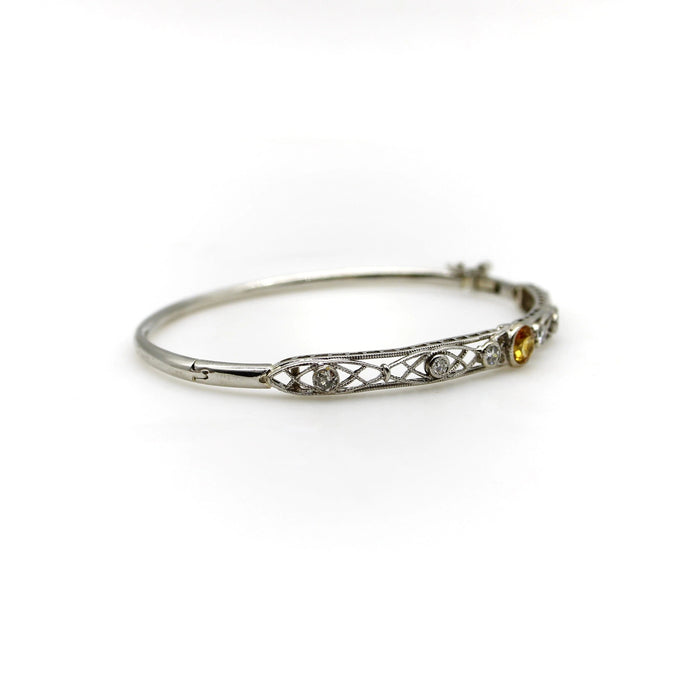 Bracelet Bracelet édouardien en filigrane de diamants et saphir jaune en platine 58 Facettes