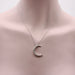 Collier Collier croissant de lune en or blanc 58 Facettes