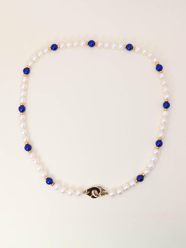 Collier DINH VAN Collier menottes R10 perles  & lapis lazuli 58 Facettes 1204.7