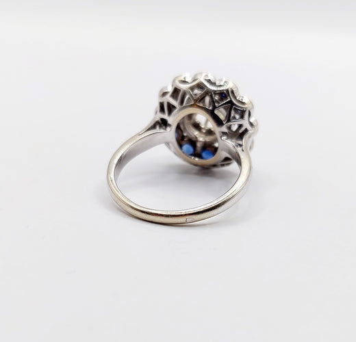 Bague 51.5 Bague marguerite Art Déco or blanc, diamant taille ancienne 0,65 carat et saphirs 58 Facettes A06329