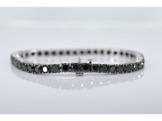 Bracelet Bracelet tennis en or blanc serti de diamants noirs tout autour 58 Facettes 2117