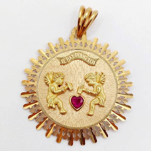 Pendentif Pendentif médaille d'amour or rose, angelots articulés "Il Bat Pour Toi" et rubis synthétique 58 Facettes A05878