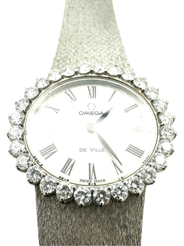 Montre OMEGA. Collection "De Ville", montre de dame vinatge or et diamants 58 Facettes
