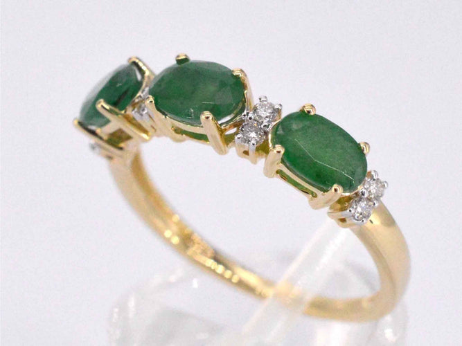 Bague Bague en or avec diamants et émeraude 58 Facettes 2127