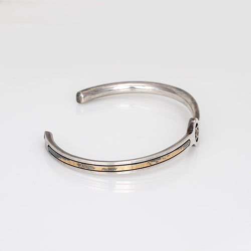 Bracelet Bracelet manchette Cartier des années 70 en argent sterling et or 18 carats, logo CC vintage signé 58 Facettes G13936