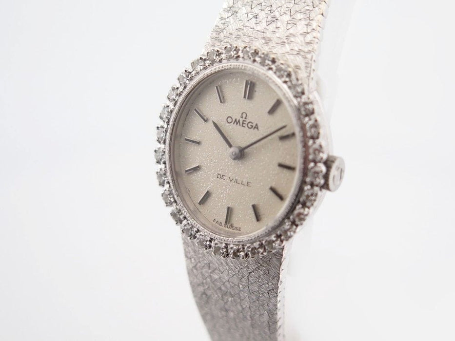 Montre vintage montre OMEGA en or blanc et 28 diamants mecanique 58 Facettes 259944