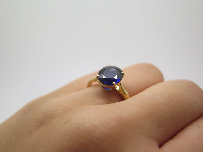 Bague Solitaire en or jaune et saphir 58 Facettes