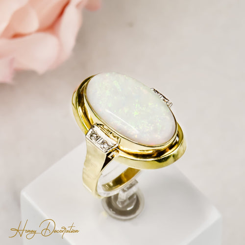 Bague 63 Magnifique bague en or et opale 58 Facettes 2619