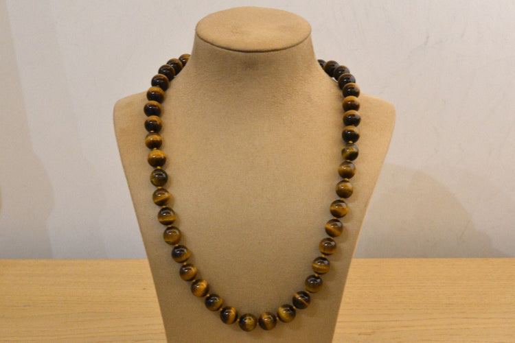 Collier Collier oeil de tigre et or 18k 58 Facettes 25046