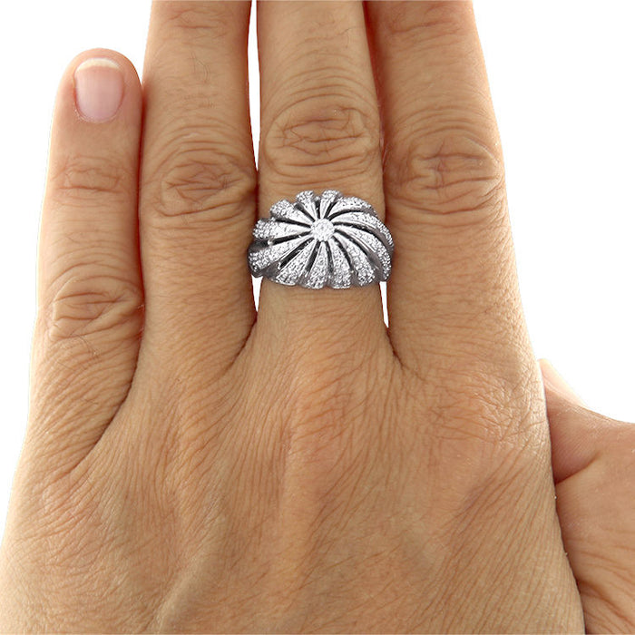 Bague vortex en or blanc et diamants