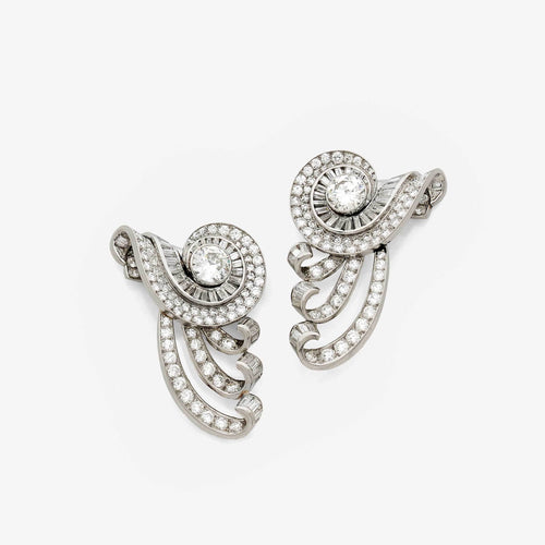 Boucles d'oreilles Clips convertibles vintage en platine et diamants français des années 1950 58 Facettes 22707