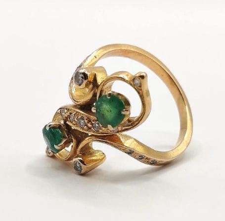 Bague 52 Bague Toi & Moi en or jaune ornée de deux émeraudes et torsadée de diamants 58 Facettes