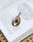 Pendentif Médaillon or rose ancien cabochon grenat et perles 58 Facettes