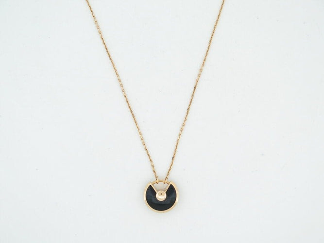 Collier collier CARTIER amulette xs 38-41 or jaune onyx et diamant 58 Facettes 262132