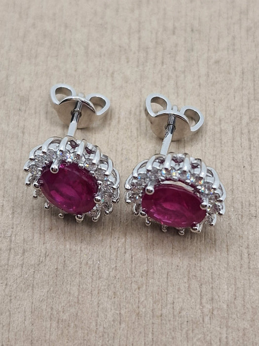 Boucles d'oreilles Boucles d'oreilles en or blanc, rubis ovales naturels et diamants 58 Facettes