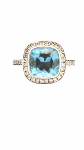 Bague en or blanc topaze bleue et diamants