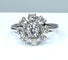 Bague 53 Bague marguerite en or blanc sertie de 9 diamants 58 Facettes AB378
