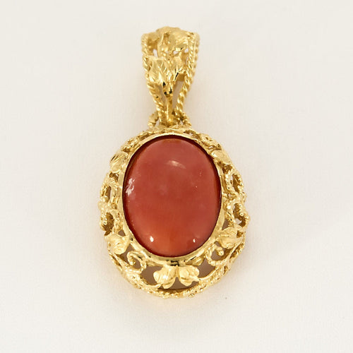 Pendentif Pendentif en or jaune et cabochon de corail 58 Facettes ENG11064X2