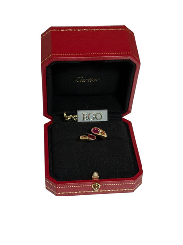 Bague 51 CARTIER - Bague Ellipse en or jaune Deux têtes croisées avec rubis 58 Facettes