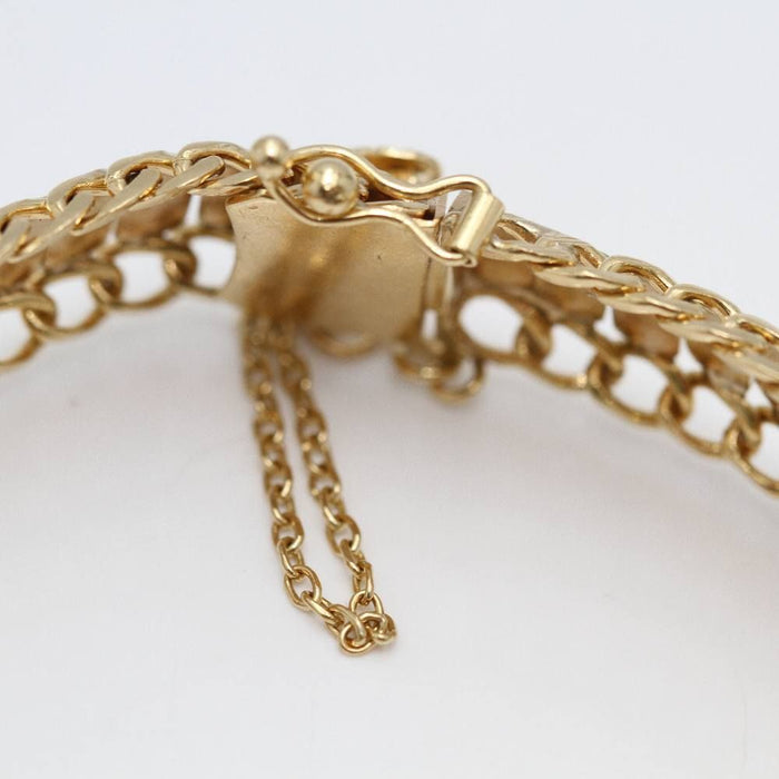 Bracelet articulé avec médaille