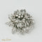 Pendentif Broche/pendentif luxueux en or blanc serti de diamants 58 Facettes 1840