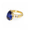 Bague 53 Bague en or jaune ornée d’un saphir bleu Ceylan et de diamants. 58 Facettes
