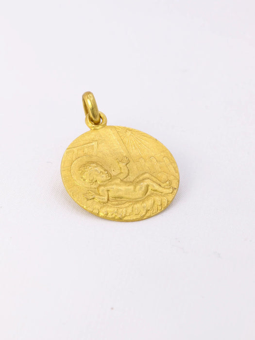 Pendentif religieux vintage Jésus nouveau né or jaune 58 Facettes 1087.17