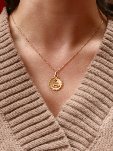 Pendentif Médaille amour Augis ronde Plus qu'hier moins que demain or jaune rubis 58 Facettes J511