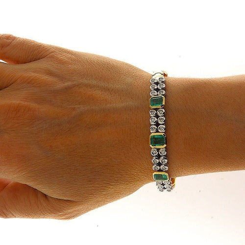 Bracelet Bracelet en or jaune et blanc avec émeraudes et diamants 58 Facettes G3838