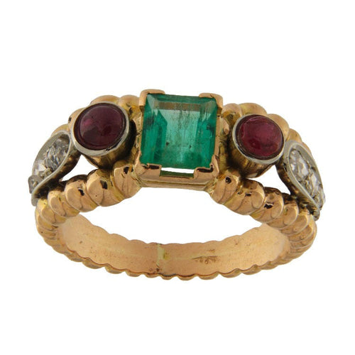 Bague Bague vintage en or jaune et blanc sertie d'une émeraude de 0,72 carat, de rubis et de diamants. 58 Facettes G3880