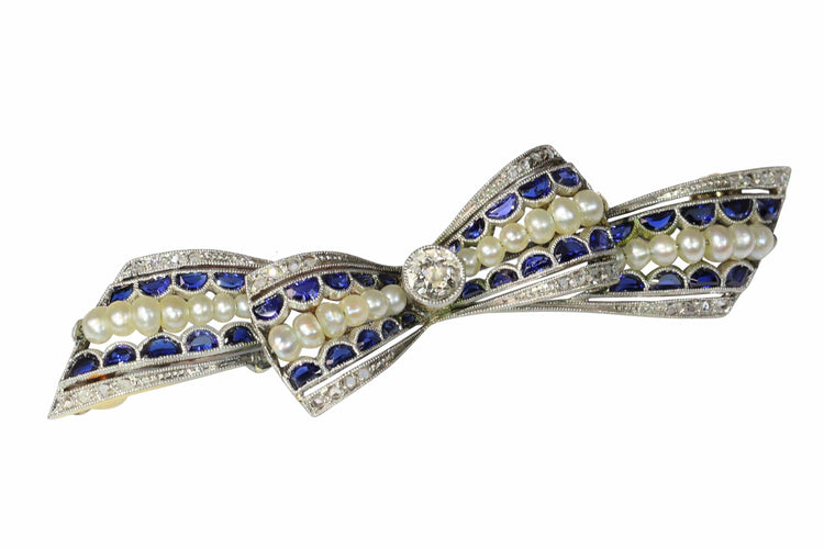 Broche Broche nœud vintage des années 1910 en saphirs et perles – Belle Époque Grace 58 Facettes 25191-0322