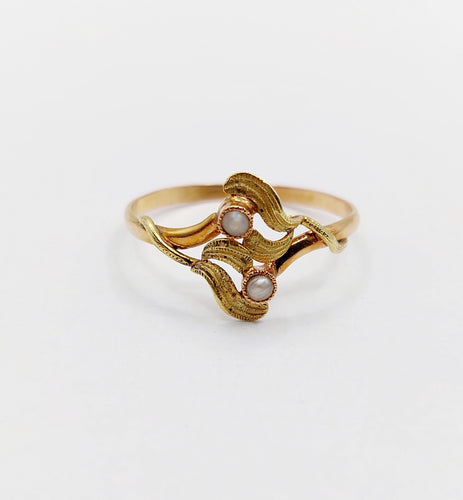 Bague 58 Bague Toi et Moi Art Nouveau or rose et jaune et perles (circa 1910) 58 Facettes A06373