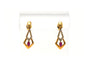 Boucles d'oreilles Boucles d'oreilles contemporaines en or jaune, serties de diamants et de rubis 58 Facettes 18367