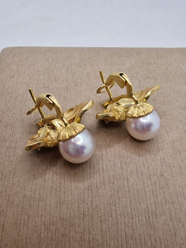 Boucles d'oreilles Boucles d'oreilles vintage en or jaune et perles en forme de feuille 58 Facettes