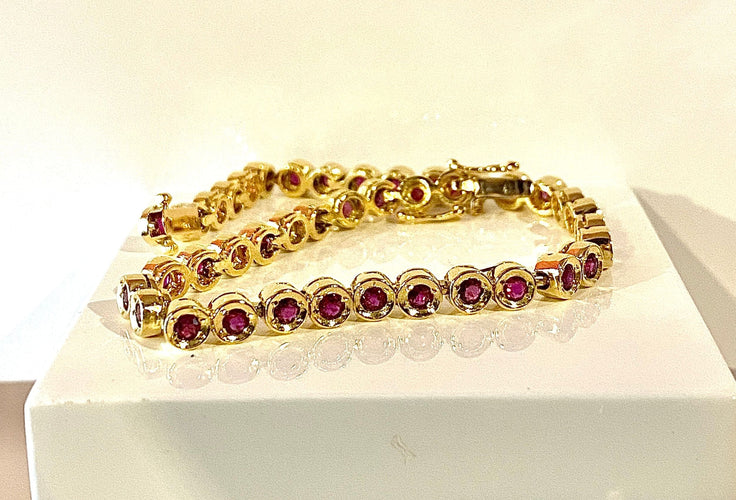 Bracelet Bracelet ligne en or jaune et rubis 58 Facettes AB609