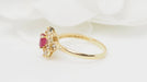 Bague Bague marguerite en or jaune, rubis et diamants 58 Facettes