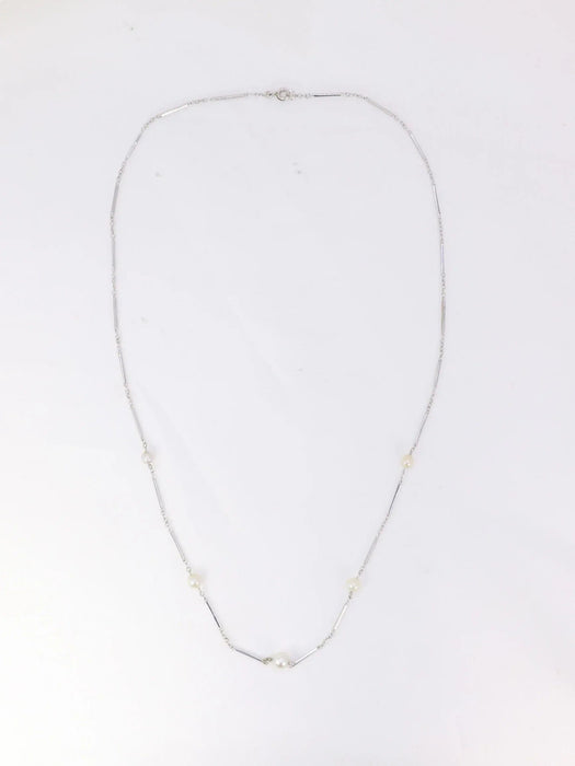 Collier Collier chaîne vintage or blanc perles 58 Facettes 941