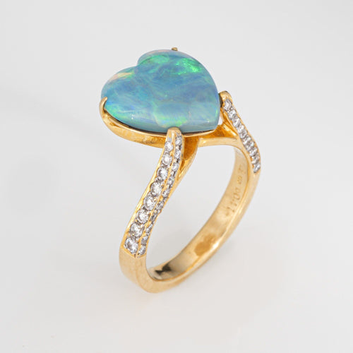 Bague Bague vintage en or jaune 18 carats, ornée d'une opale en forme de cœur et de diamant, taille 6,75. Bijou ancien de qualité. 58 Facettes G14030