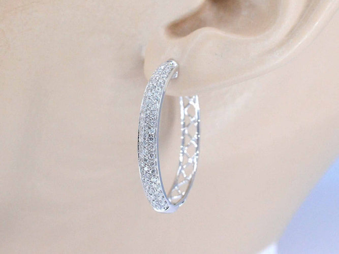 Boucles d'oreilles Boucles d'oreilles créoles en or blanc avec diamants 58 Facettes 2052