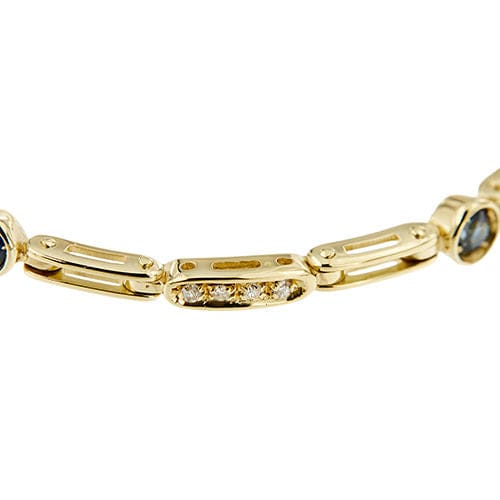 Bracelet segmenté en or jaune orné de saphirs et de diamants