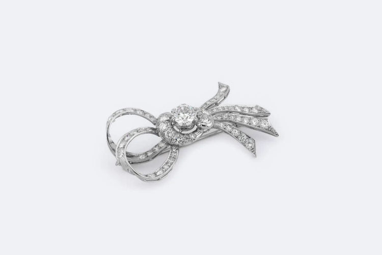 Broche Oro Bianco Broche vintage en forme de nœud papillon avec diamants 58 Facettes spl112