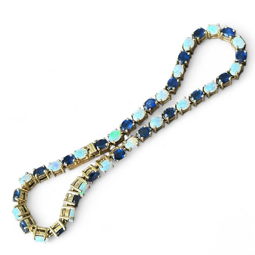 Bracelet Bracelet or jaune serti de saphirs et opales 58 Facettes 344