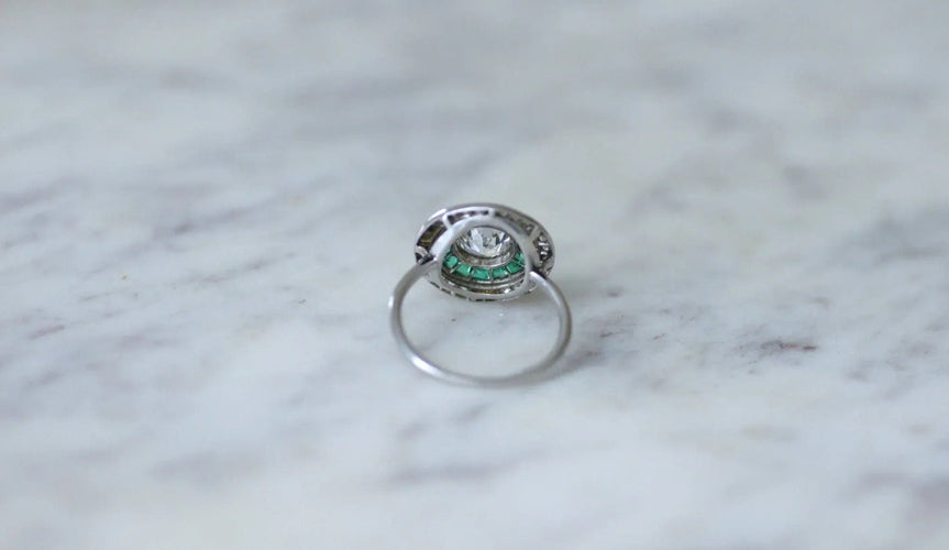Bague Bague cible halo diamant et émeraudes calibrées 58 Facettes