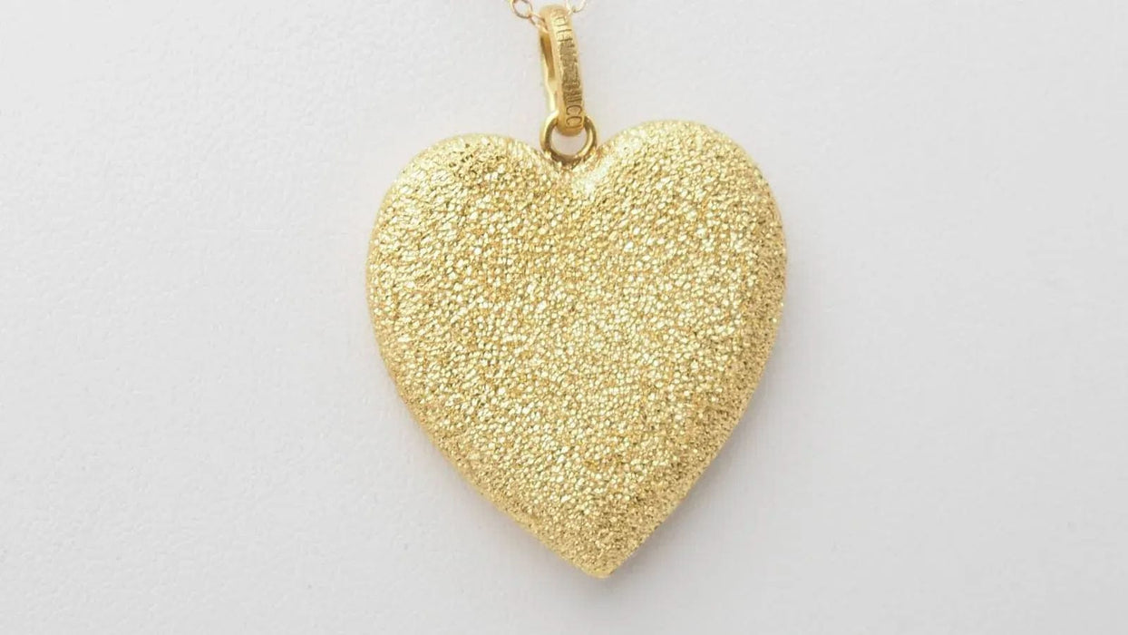 Pendentif Pendentif Coeur sablé de Carolina BUCCI en or jaune 58 Facettes 32863