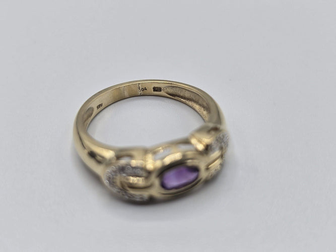 Bague 54 Bague OR Jaune 14k sertie d'une tourmaline au centre et d'éclats de diamants sur les côtés 58 Facettes 1-0000437/5
