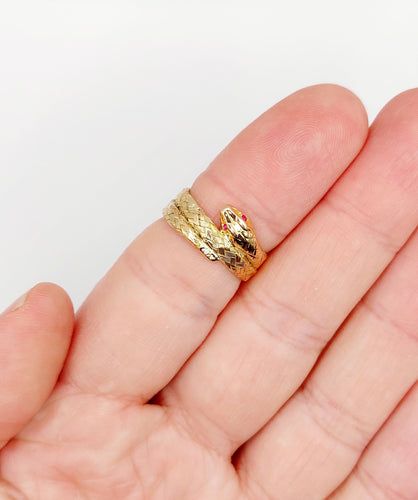 Bague 54.5 Bague serpent or rose finement tressée yeux rubis 58 Facettes A04370