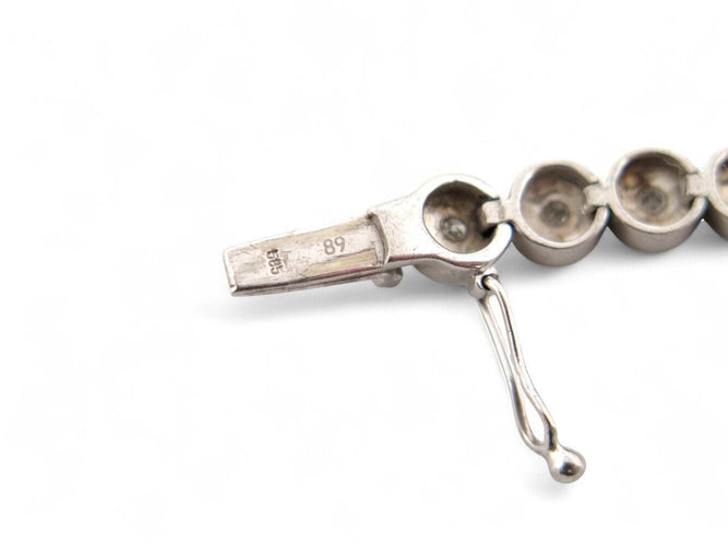 Bracelet bracelet tennis t19 serti de 35 diamants 2.1ct en or blanc 14k 16gr 58 Facettes 268155