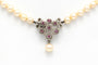Collier Collier Années 70 en or blanc 18 carats, perles et rubis 58 Facettes B278